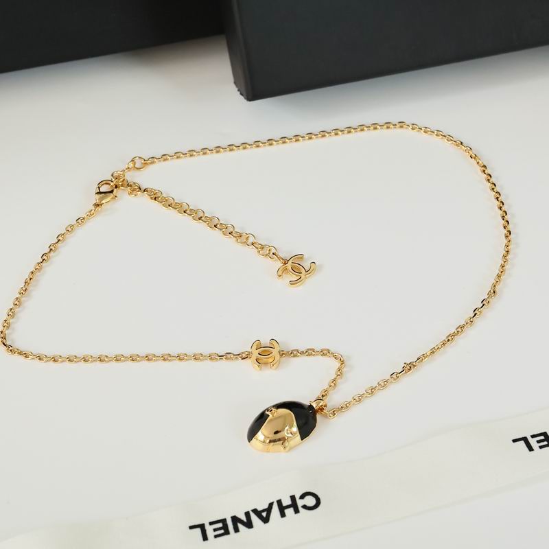 Chanel CC Logo Gold-Tone Pendant Necklace with Black Enamel Heart