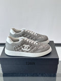 Chanel Quilted CC Logo Sneakers in Gray